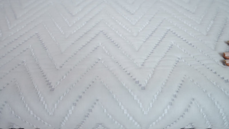 Feeling the soft to touch and cooling snow-silk fabric of Elmira snow mattress